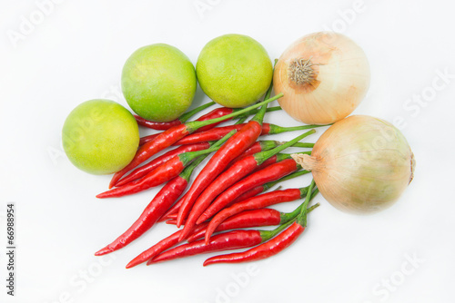 Fototapeta Naklejka Na Ścianę i Meble -  A set of vegetable: chilies, lime, and onion