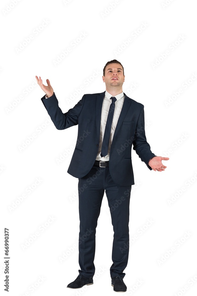 Businessman standing with hands outstretched Businessman standing with hands outstretched