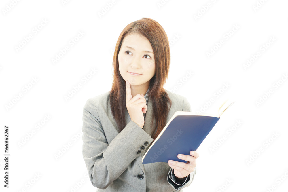 困惑した表情のOL 困惑した表情のOL