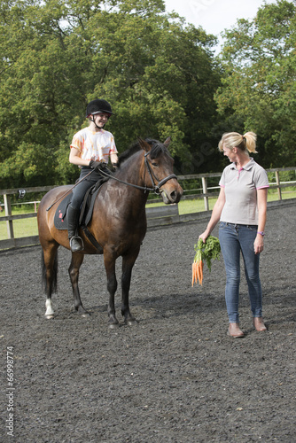 Using a bunch of carrots to train a pony and rider