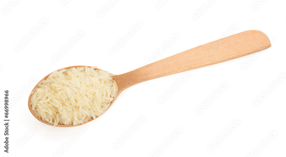 rice in wooden spoon on white rice in wooden spoon on white