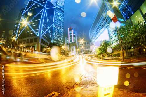 Photography the light trails on the modern building background in hongkong c