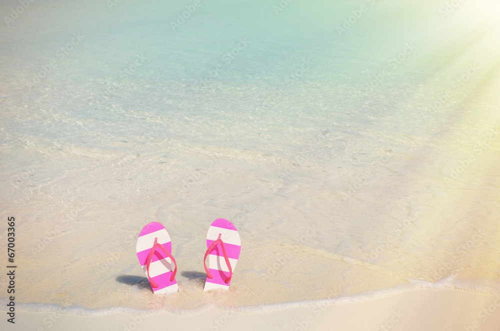 Fototapeta premium Flip-flop on the beach