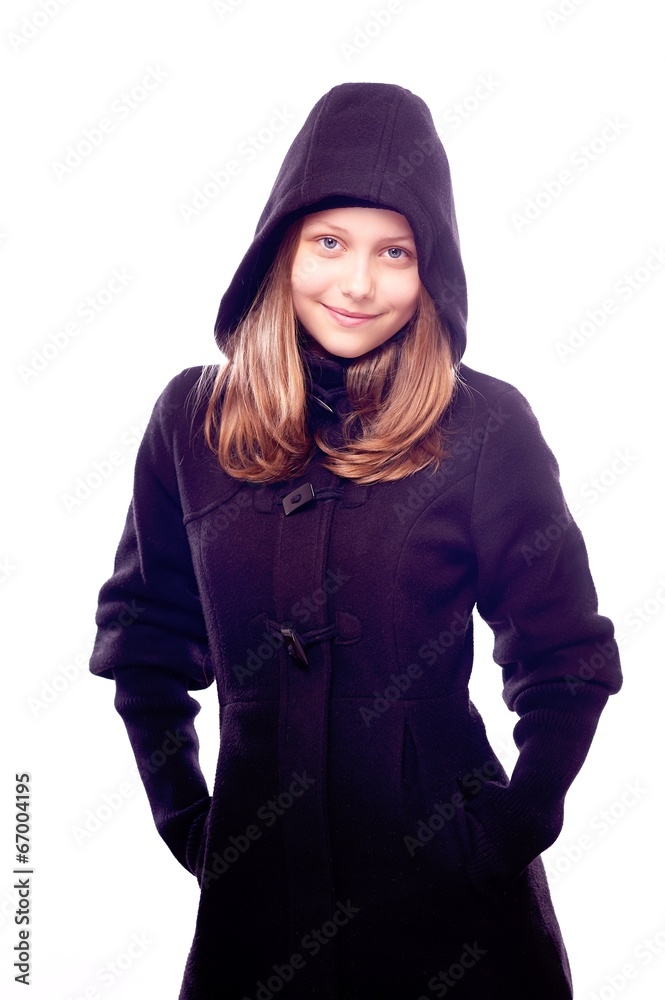 Teen girl in coat posing