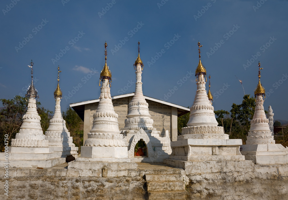 white Buddhist Stupas. Indein