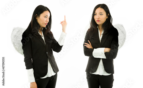 Fotografia Asian young businesswoman dressed up as white angel showing