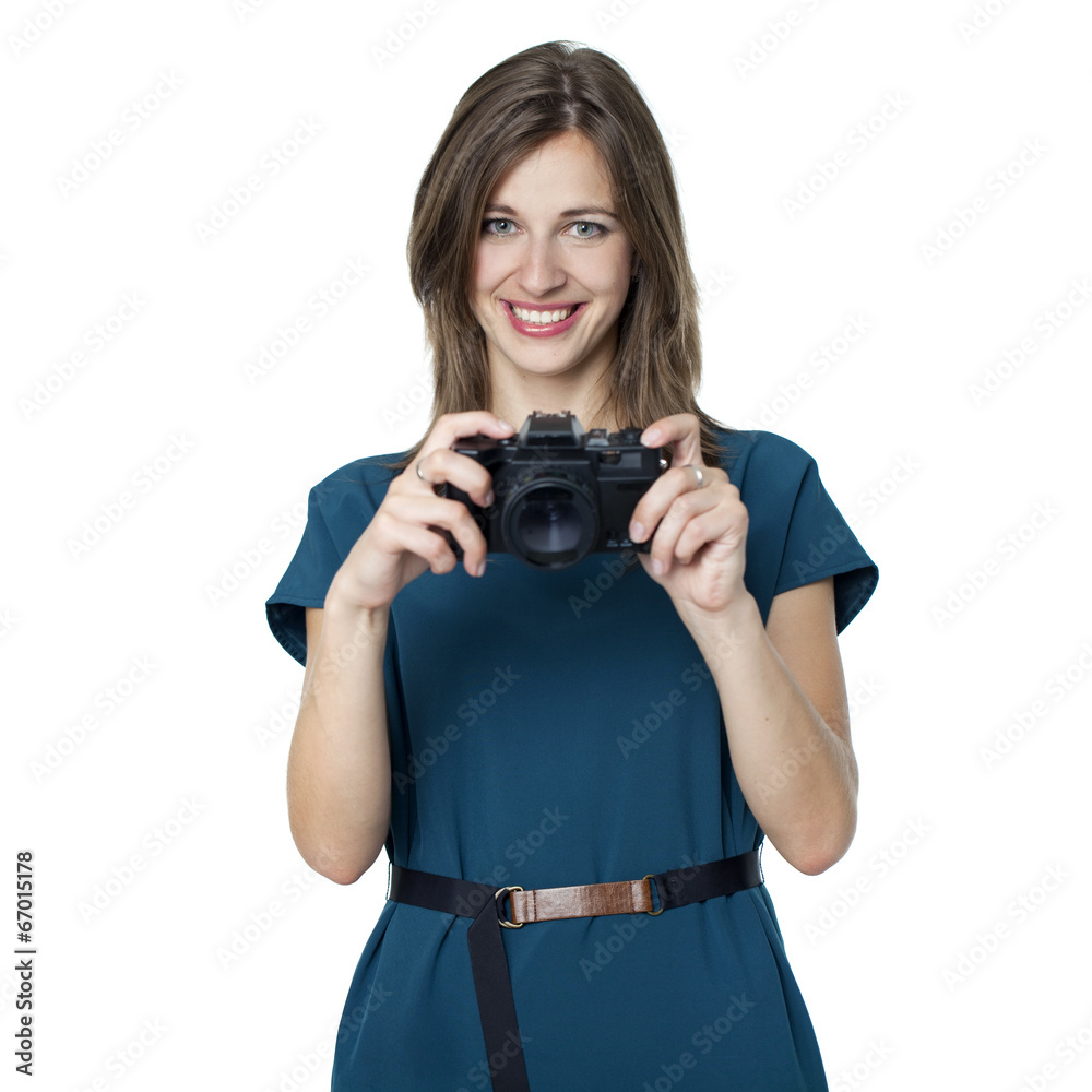 Happy young woman using a camera to take photo Happy young woman using a camera to take photo