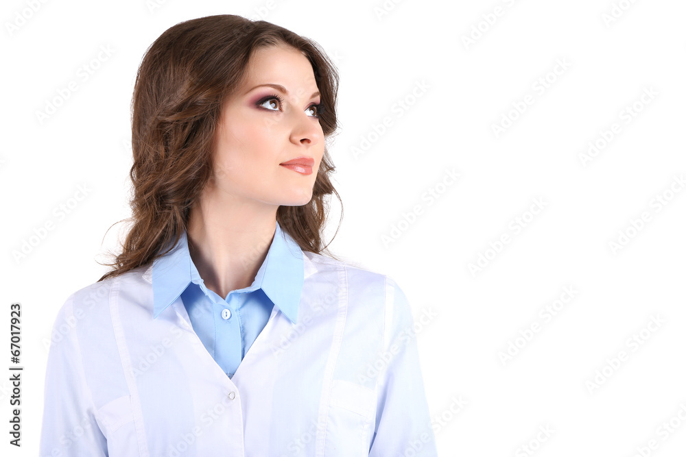 Young beautiful doctor isolated on white Young beautiful doctor isolated on white