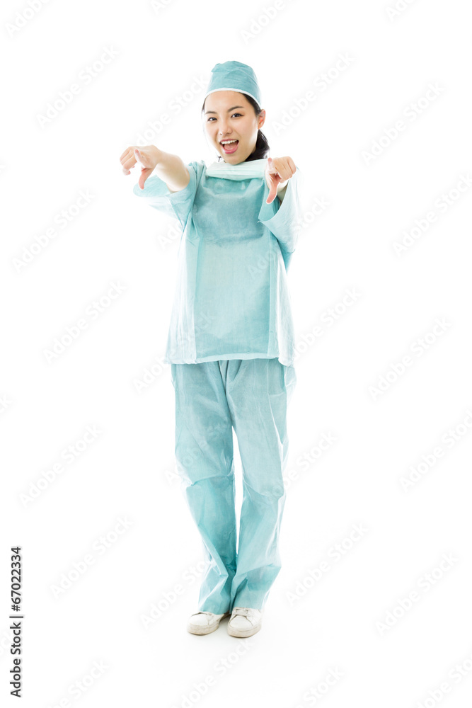 Asian female surgeon pointing at you from both hands isolated on Asian female surgeon pointing at you from both hands isolated on