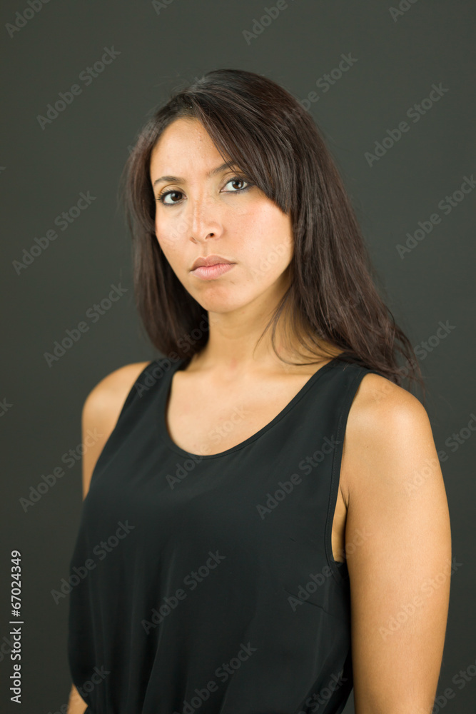 Portrait of a young woman looking serious
