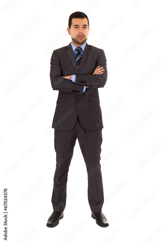 young latin man standing wearing grey suit young latin man standing wearing grey suit