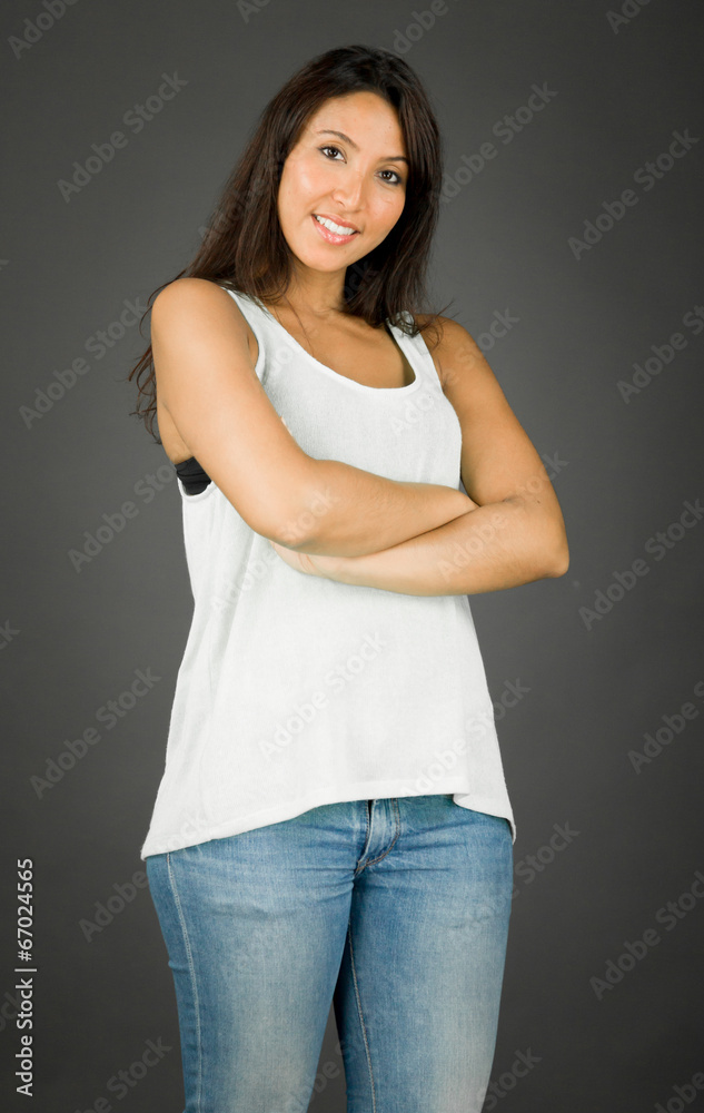Confident young woman with her arms crossed