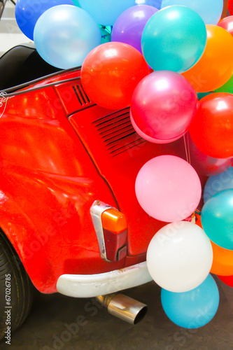 balloon and red car