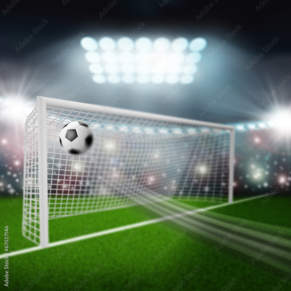 Fototapeta premium soccer ball flies into the goal