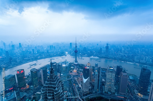 shanghai at dusk with cloudy sky