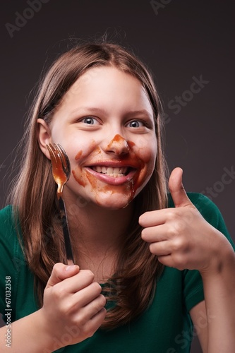 Teen girl with fork