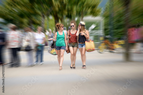 three young women go shopping