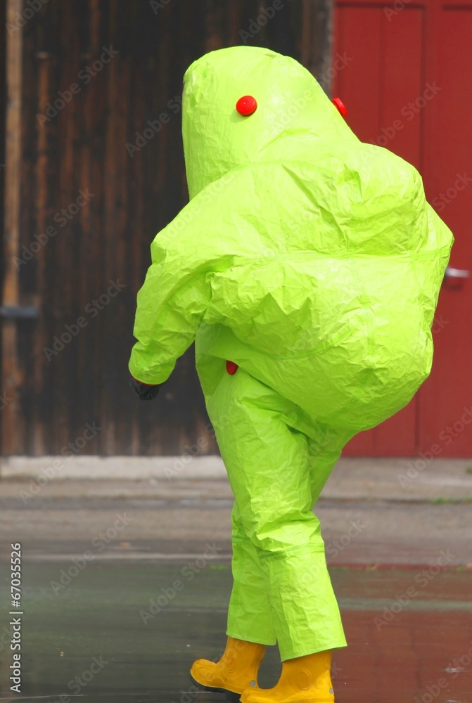 man with the yellow suit and breathing apparatus to enter contam Stock