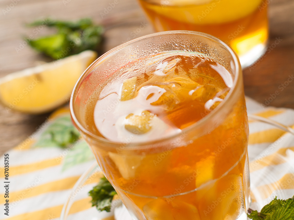 Iced tea with lemon slices, selective focus Iced tea with lemon slices, selective focus