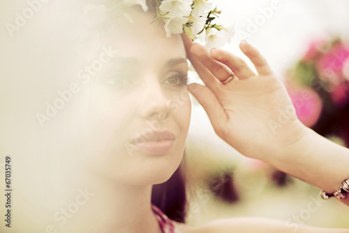 Flower nymp with the colorful wreath photo