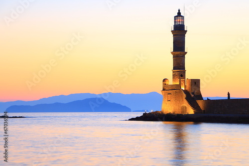 Seascape view of lighthouse in dusk colors Chania Crete