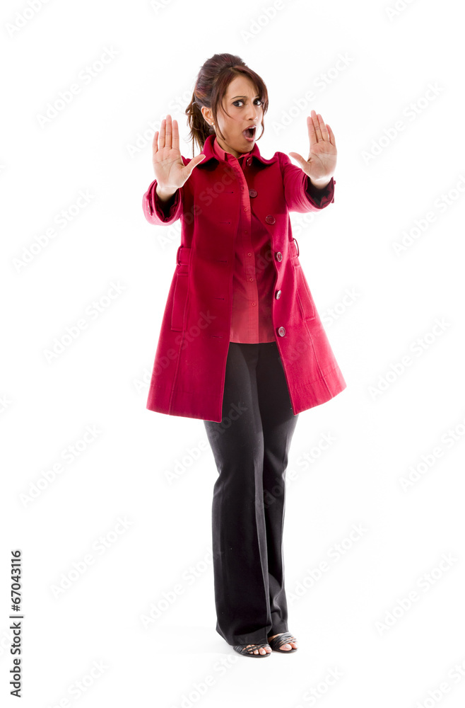 Indian young woman making stop gesture sign from both hands Indian young woman making stop gesture sign from both hands