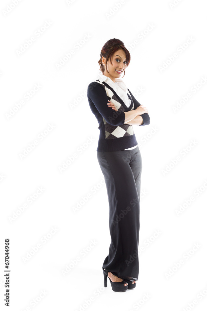 Confident Indian young woman standing with arms crossed