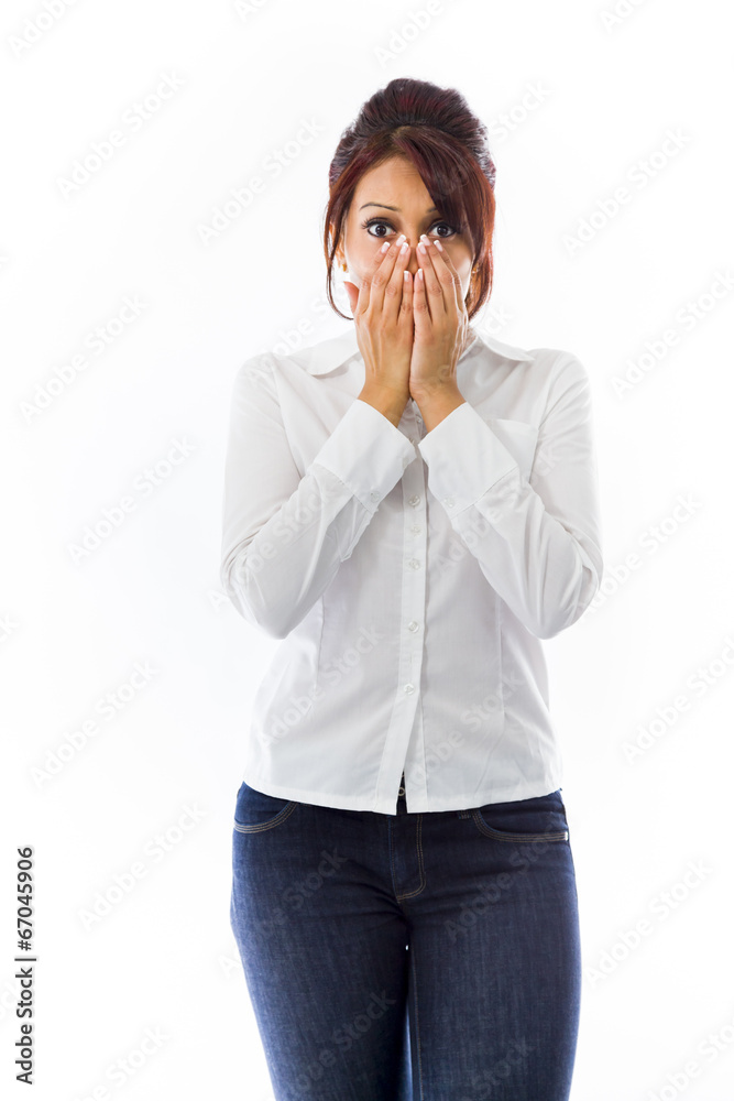 Shocked Indian young woman covering her face Shocked Indian young woman covering her face
