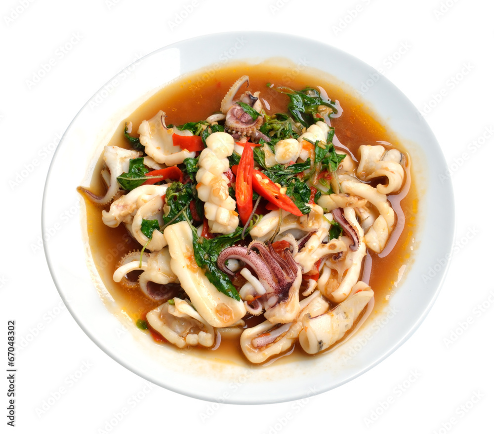 stir fried squid with chilli and basil isolated on white