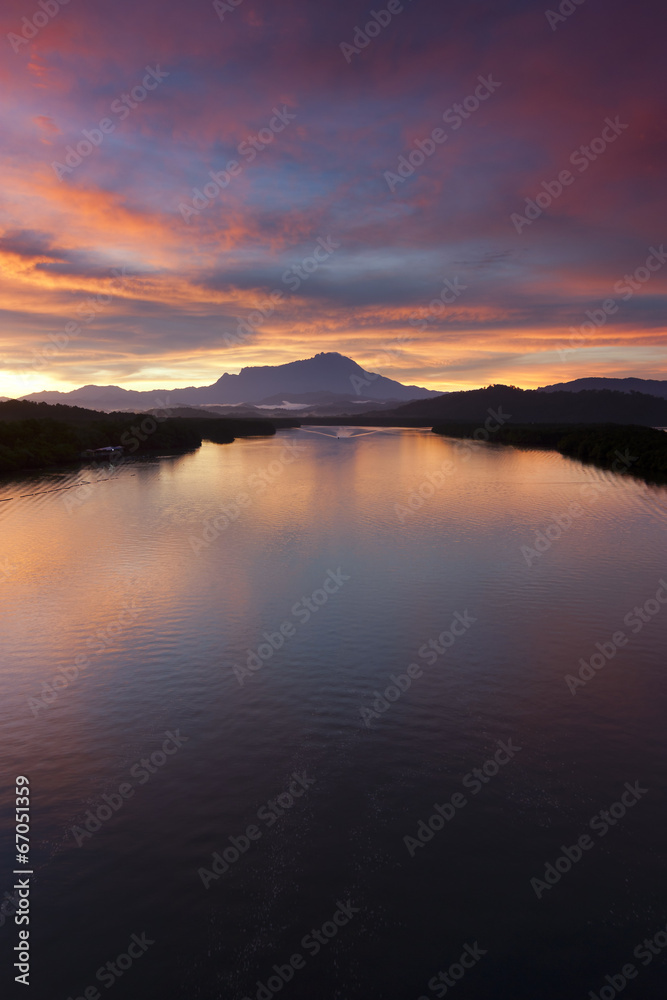 Sunrise with Mount Kinabalu at the background in Sabah, Malaysia Sunrise with Mount Kinabalu at the background in Sabah, Malaysia