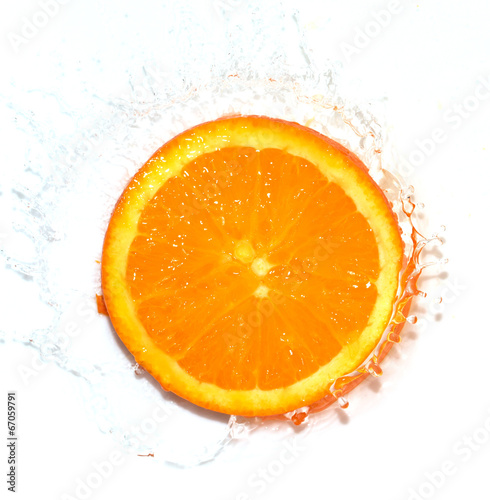 orange in water on white background