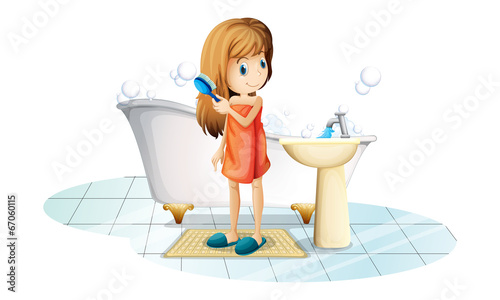 A girl combing her hair