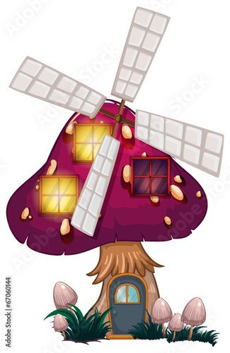 A big mushroom house with a windmill