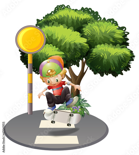 A young man skateboarding in the street