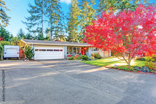 House exterior with garage and driveway view