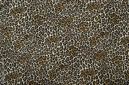 Brown and black leopard pattern. Animal print as background.