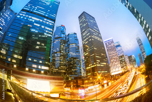 Canvas Print the light trails on the modern building background in hongkong c