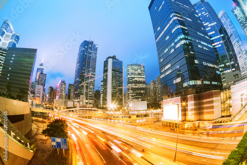 Canvas Print the light trails on the modern building background in hongkong c