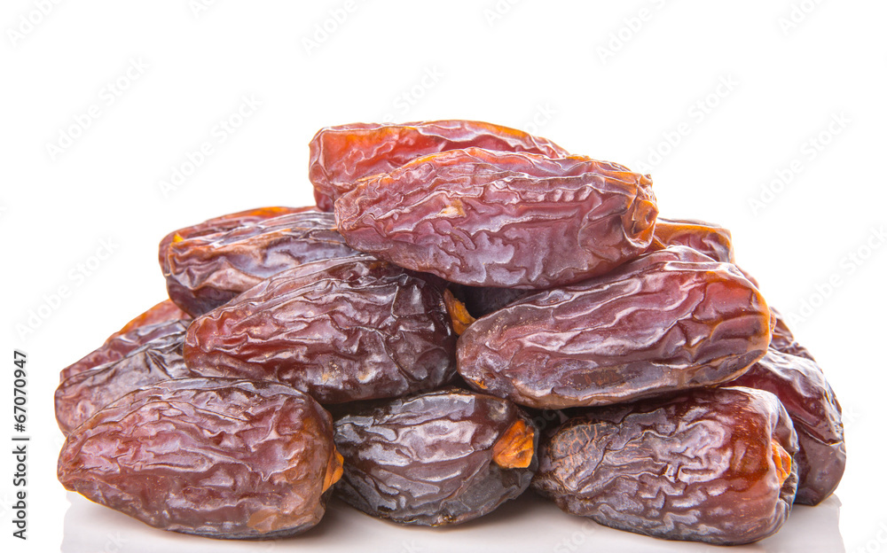 Date fruits over white background