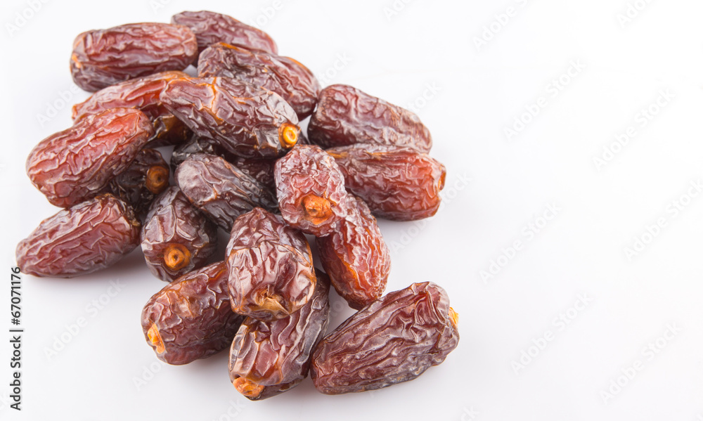 Date fruits over white background Date fruits over white background