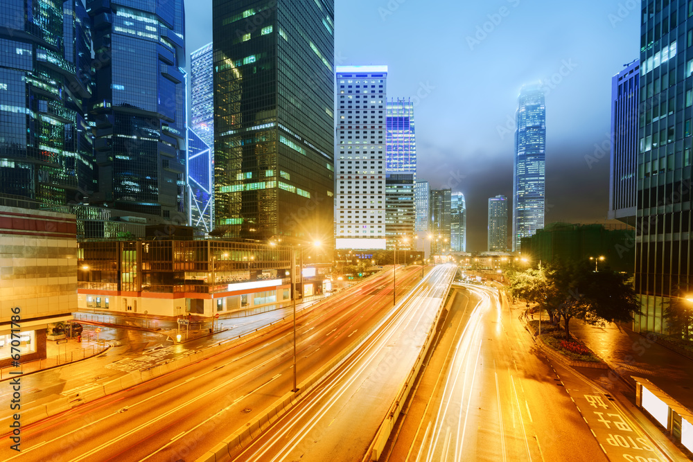 the light trails on the modern building background in hongkong c