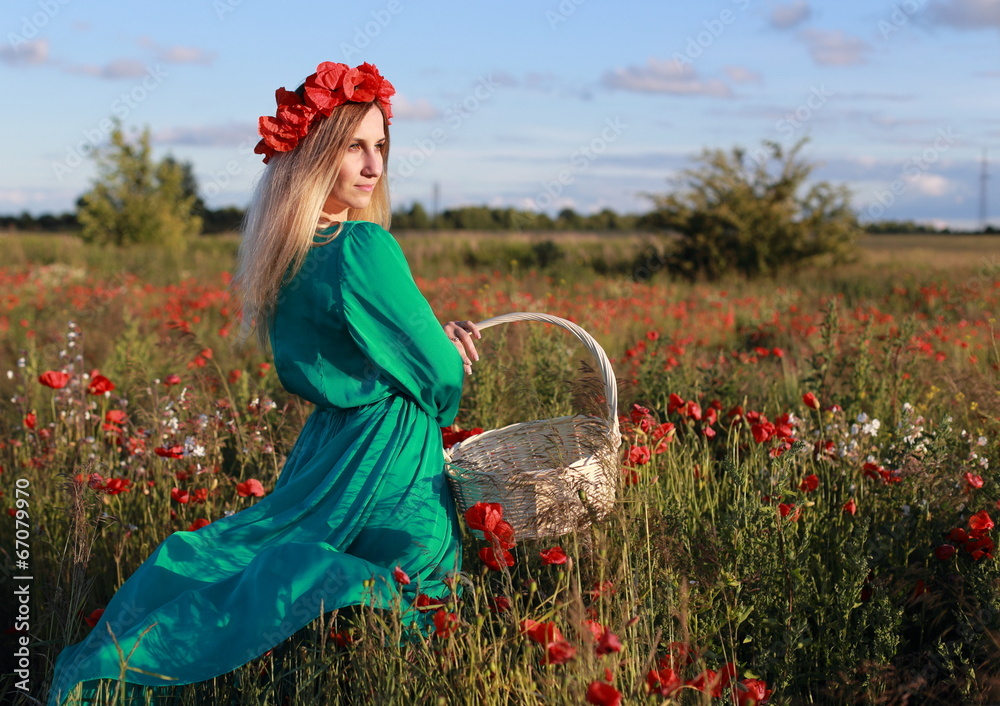 Girl on a poppy field