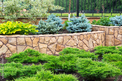Landscape design in home garden, landscaping of backyard or yard in summer