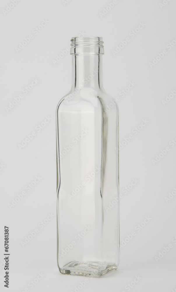 Empty bottle on light grey background Empty bottle on light grey background