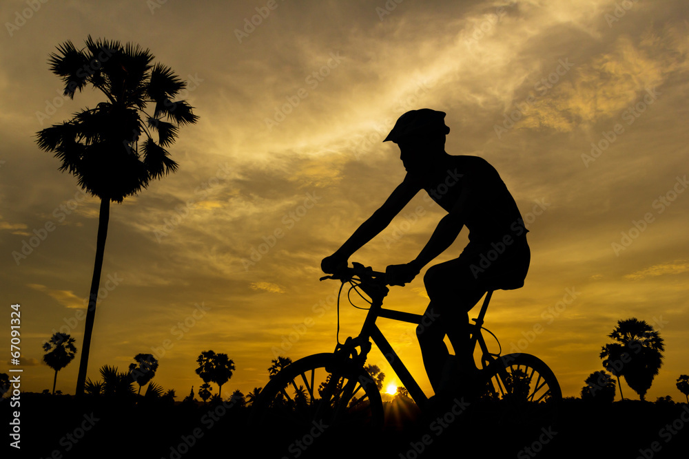 Fototapeta premium Cycling on sunset