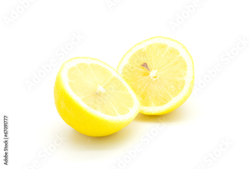 Ripe yellow lemons on cutting