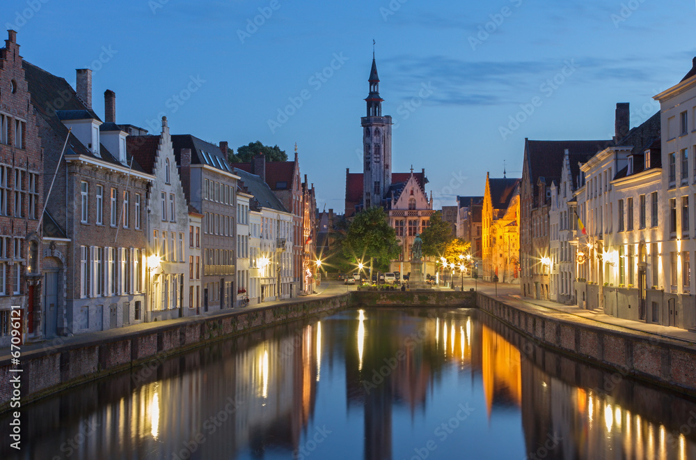 Bruges - Canal and Spigelrei street at dusk