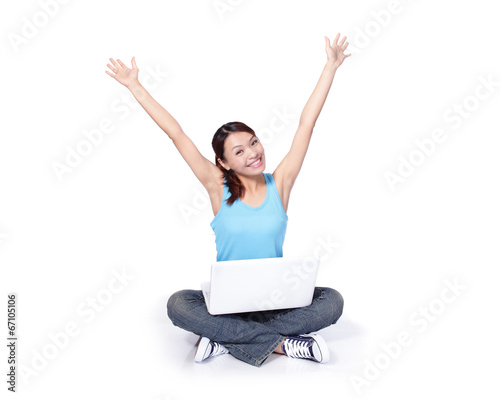 Woman student happy sitting with laptop © ryanking999