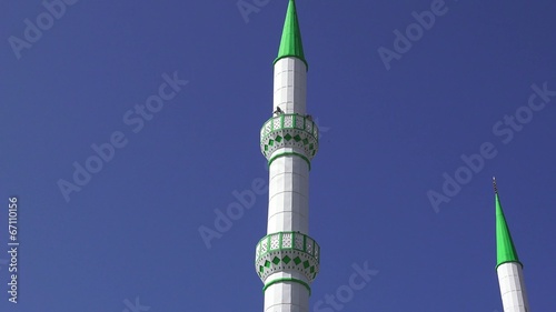 Islamic minaret with loudspeaker in Istanbul photo