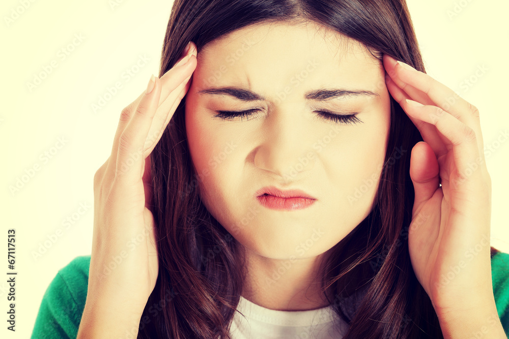 Teen woman with headache Teen woman with headache